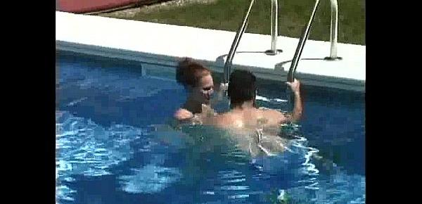  Stunning MILF getting her pussy licked in the pool